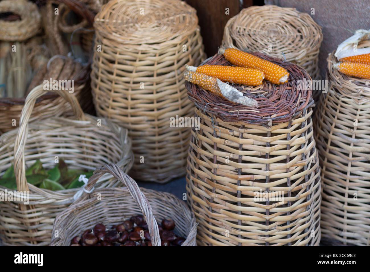 handmade wicker baskets made from corn cobs and chestnuts Stock Photo