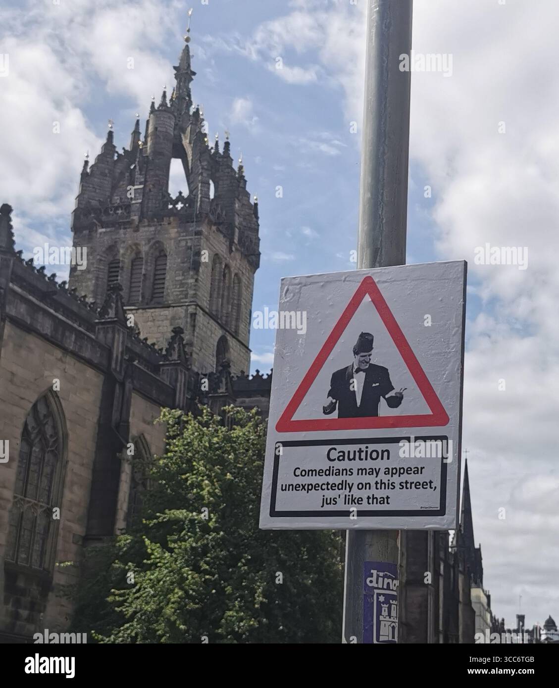 Street scenes and acts distributing flyers for their shows on the Royal Mile in Edinburgh during the world famous Edinburgh Fringe Festival. - Smartphone Captured Stock Image
