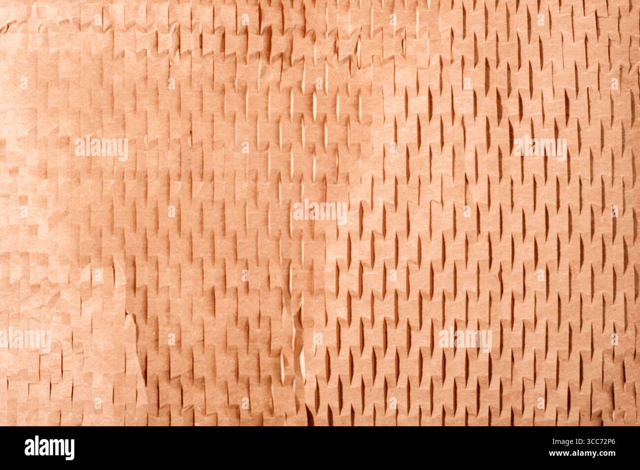 Sliced brown paper for packaging. Using recyclable materials concept. Background, texture. Selective focus. Stock Photo