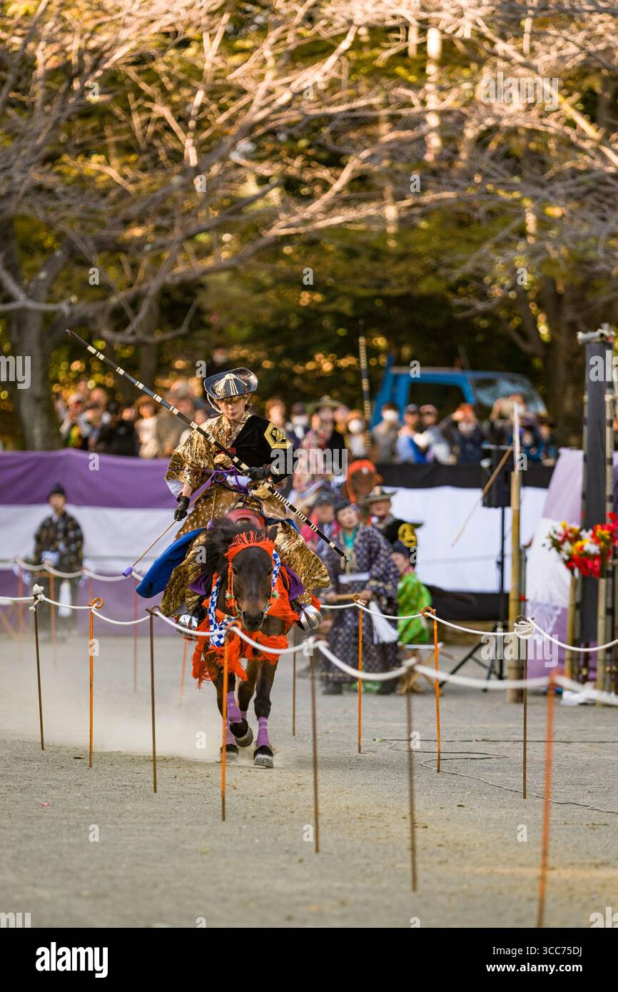 Yabusame Ritual A skilled archer dressed in traditional attire performs Yabusame, a ...