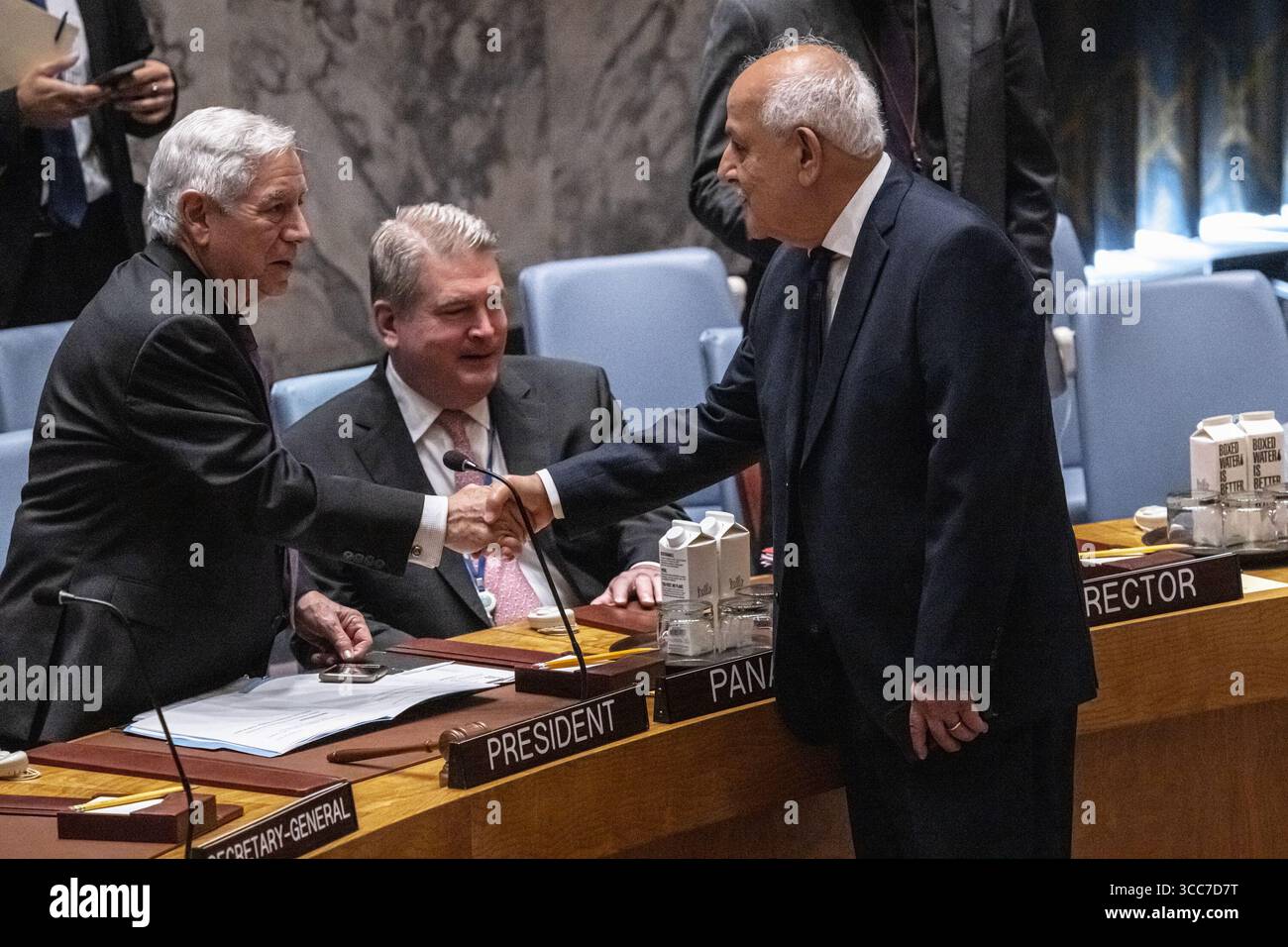 Un Palestinian Representative UN Palestinian representative, Riyad Mansour shakes hands with the ...
