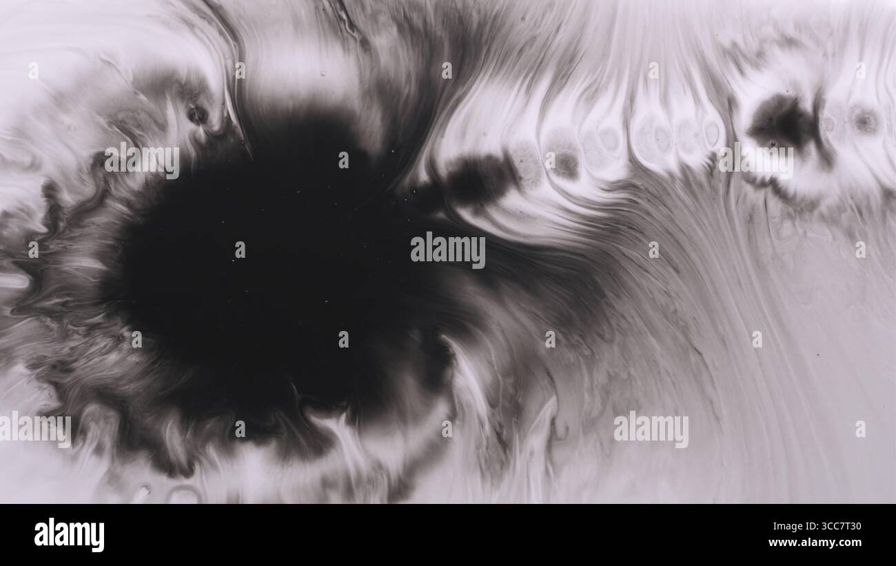 Ink splatter. Fluid spill. Defocused dark black white color chemical ...