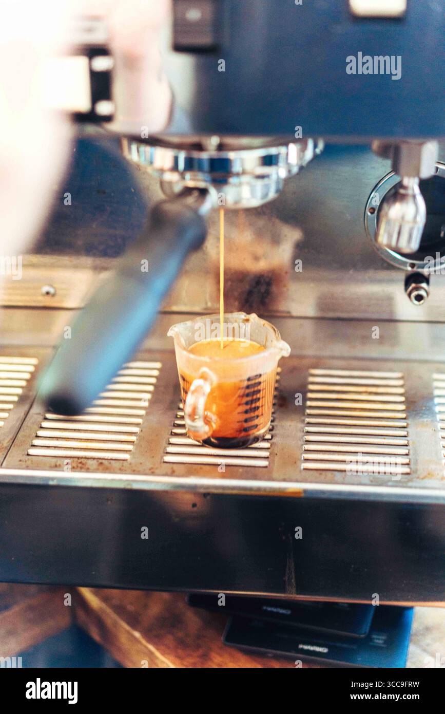 Espresso Pour from Group Head (Front View) Stock Photo
