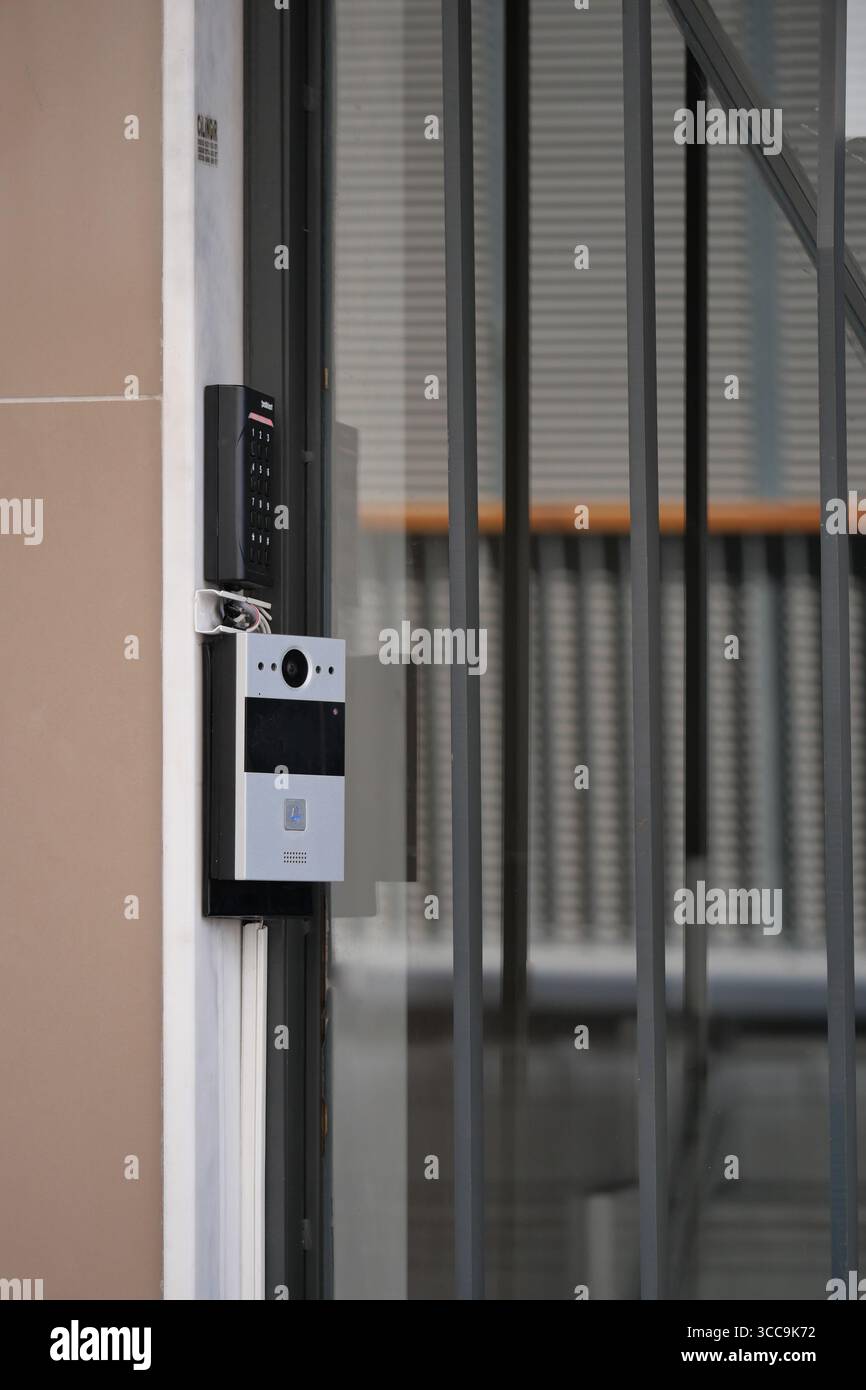 Door entry system installed at a modern building entrance Stock Photo ...
