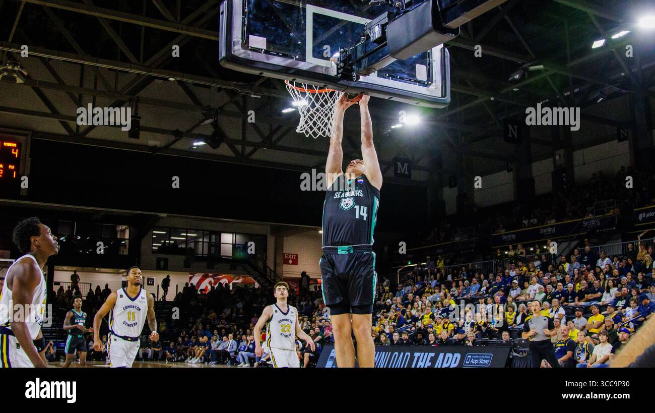 Edmonton, Canada. 10th Aug, 2025. Winnipeg Sea Bear (14) Kyler Filewich reaches up for the dunk against the Edmonton Stingers in Regular Season CEBL action in Edmonton (Photo by Ron Palmer/SOPA Images/Sipa USA) Credit: Sipa USA/Alamy Live News Stock Photo