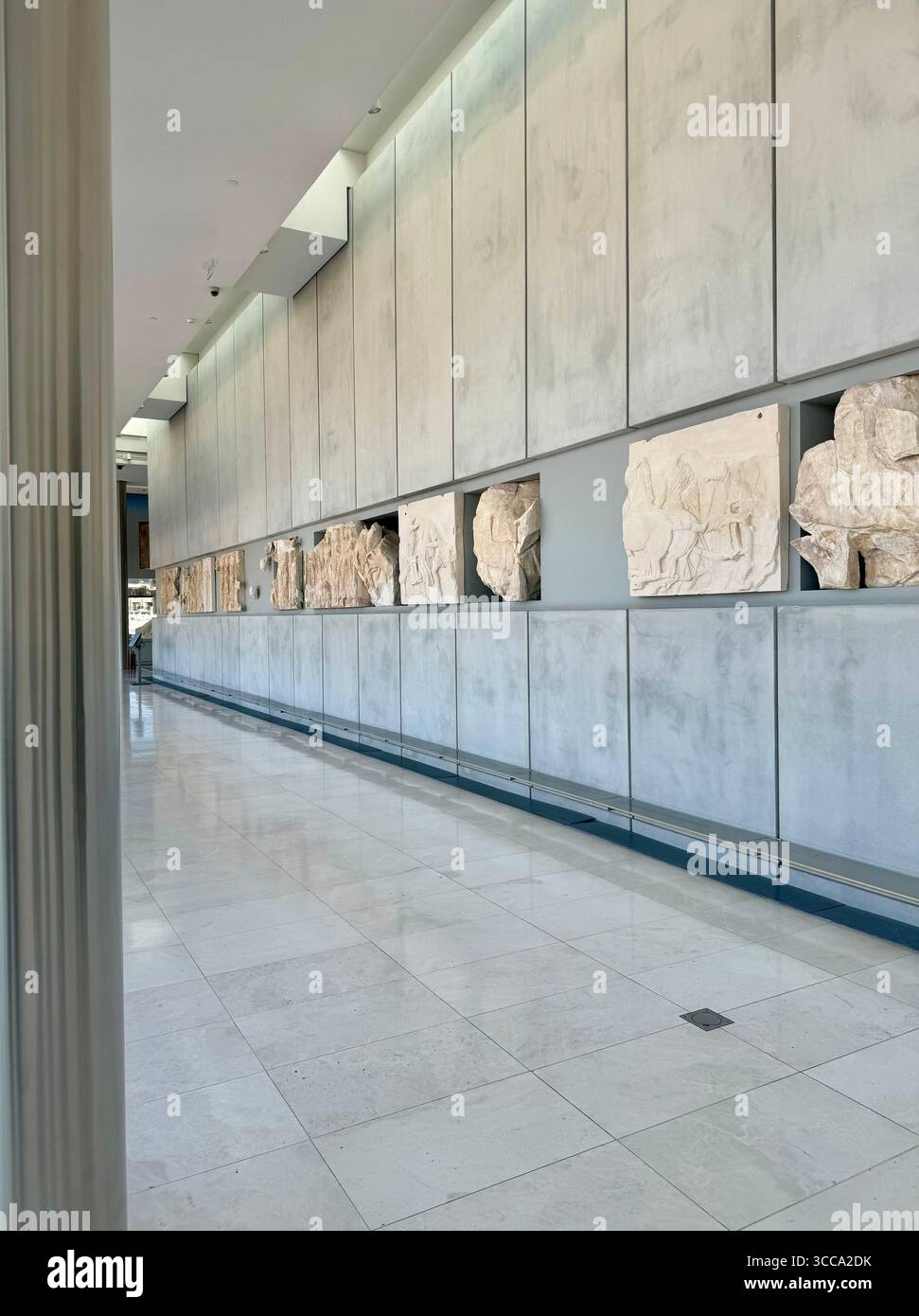 Interior views of the Acropolis Museum in Athens, Greece, showcasing ancient marble sculptures and classical artifacts. - Smartphone Captured Stock Image