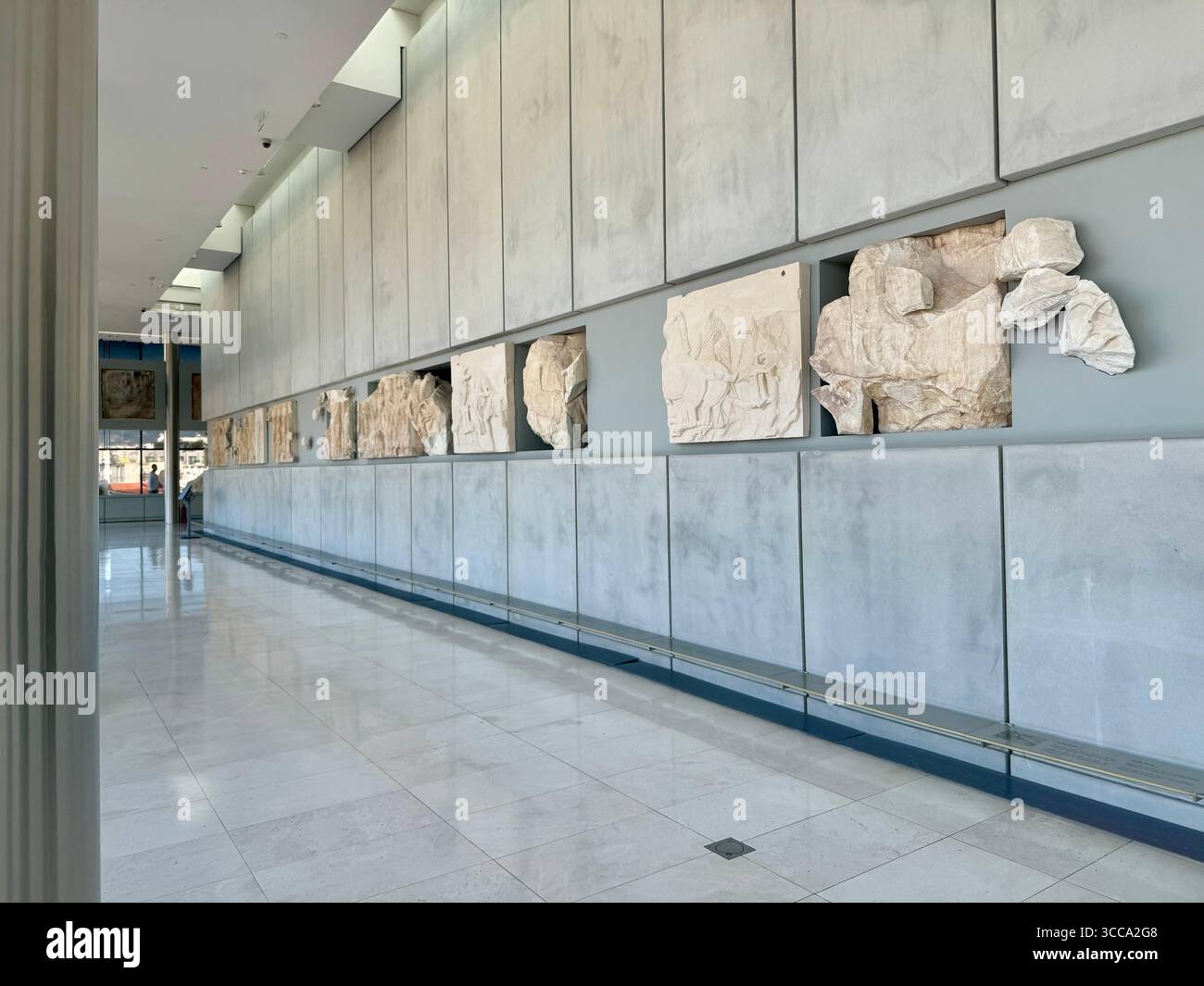 Interior views of the Acropolis Museum in Athens, Greece, featuring Parthenon marble sculptures and friezes. - Smartphone Captured Stock Image