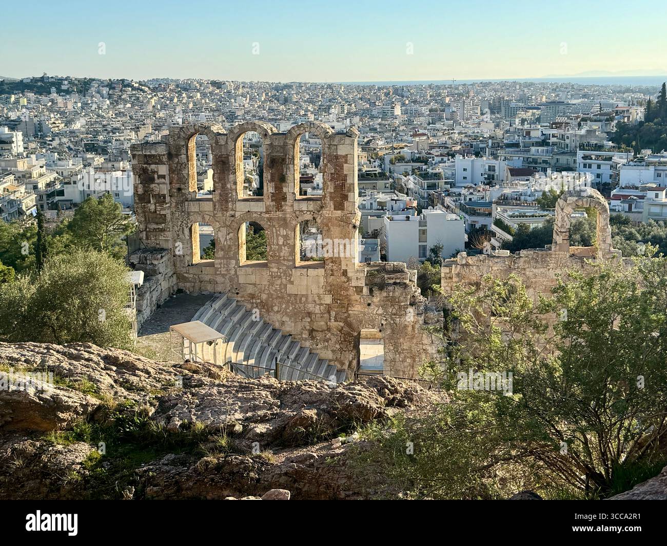 Odeon of Herodes Atticus ancient stone theater in Athens with panoramic city view - Smartphone Captured Stock Image