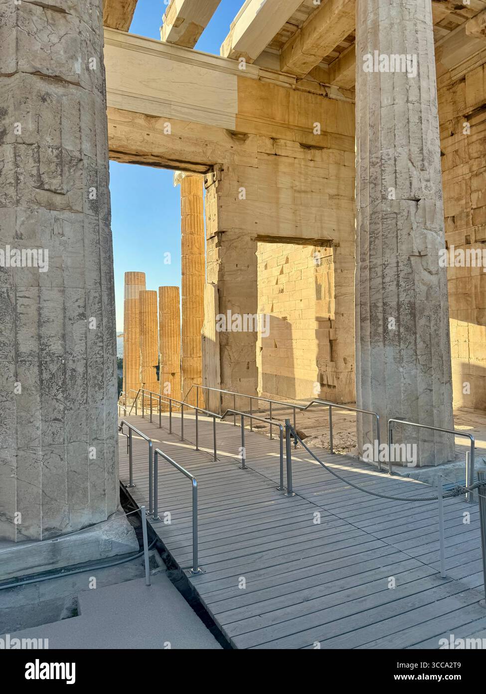 Acropolis Propylaea, the ancient monumental gateway to the Acropolis of Athens, featuring white marble Doric columns dating back to 432 BC. - Smartphone Captured Stock Image