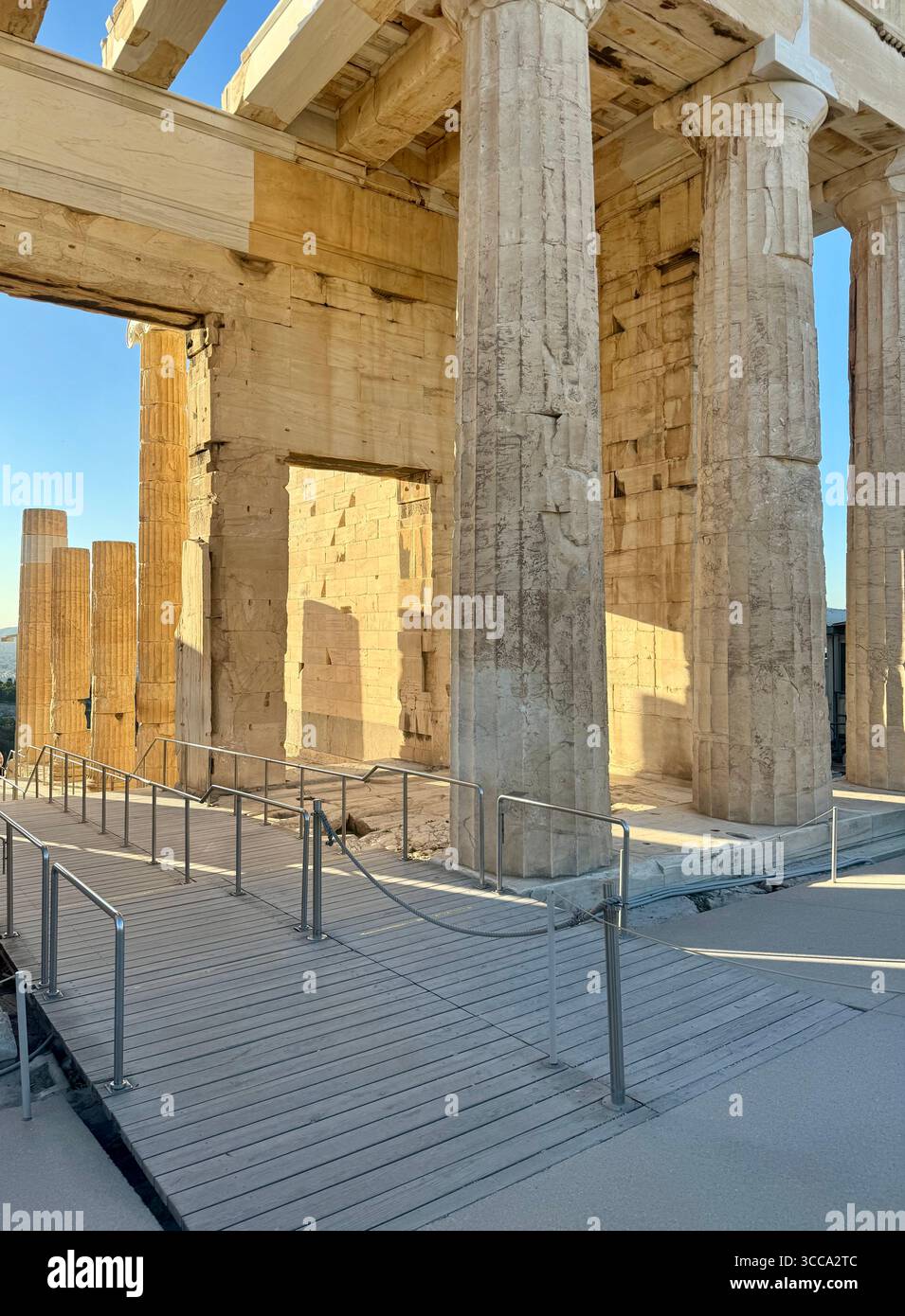 Acropolis Propylaea, the ancient monumental gateway to the Acropolis of Athens, featuring white marble Doric columns dating back to 432 BC. - Smartphone Captured Stock Image