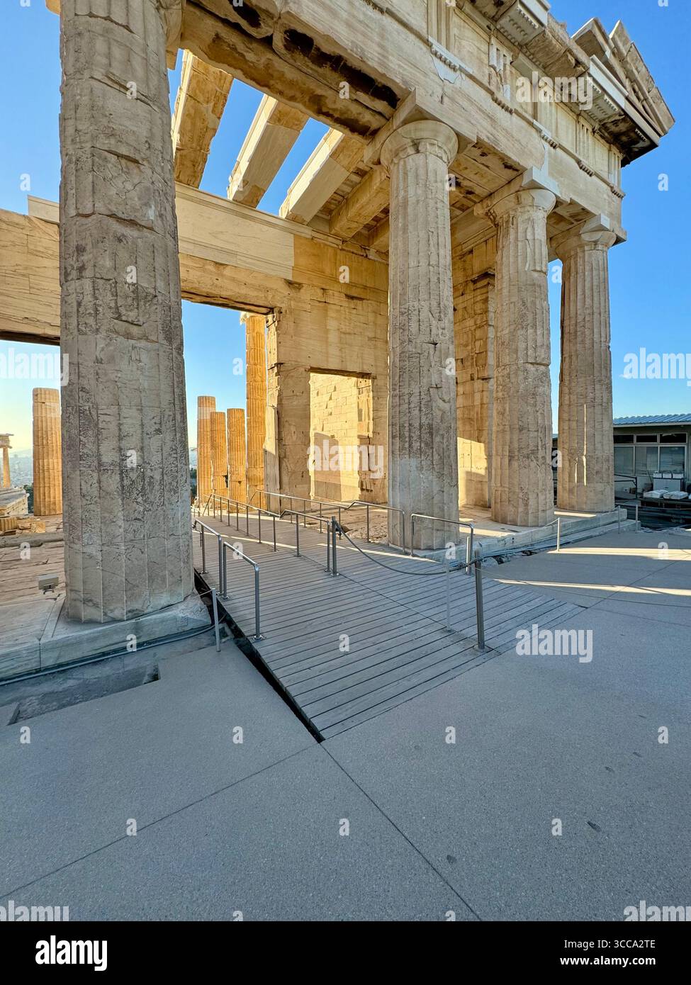 Acropolis Propylaea, the ancient monumental gateway to the Acropolis of Athens, featuring white marble Doric columns dating back to 432 BC. - Smartphone Captured Stock Image