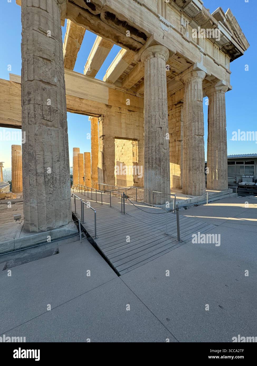 Acropolis Propylaea, the ancient monumental gateway to the Acropolis of Athens, featuring white marble Doric columns dating back to 432 BC. - Smartphone Captured Stock Image