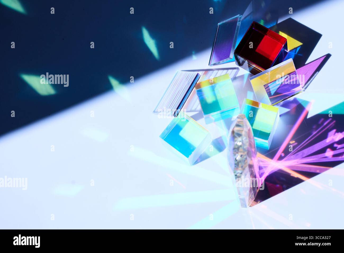 Colorful Prisms. Colorful glass prisms casting vibrant reflections and refractions Stock Photo