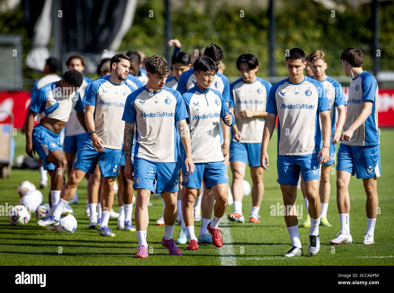 ROTTERDAM - Jordan Bos and Inbeom Hwang during training ahead of the Champions League third qualifying round match between Fenerbahçe and Feyenoord, on August 9, 2025, in Rotterdam, Netherlands. ANP KOEN VAN WEEL Stock Photo