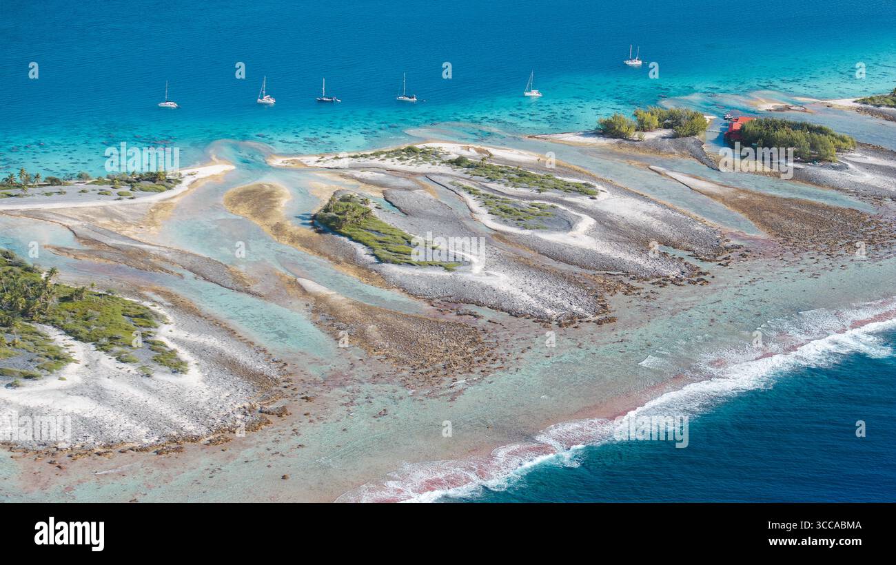Sandy Islets Aerial view of turquoise waters swirling around sandy shores, meeting ...