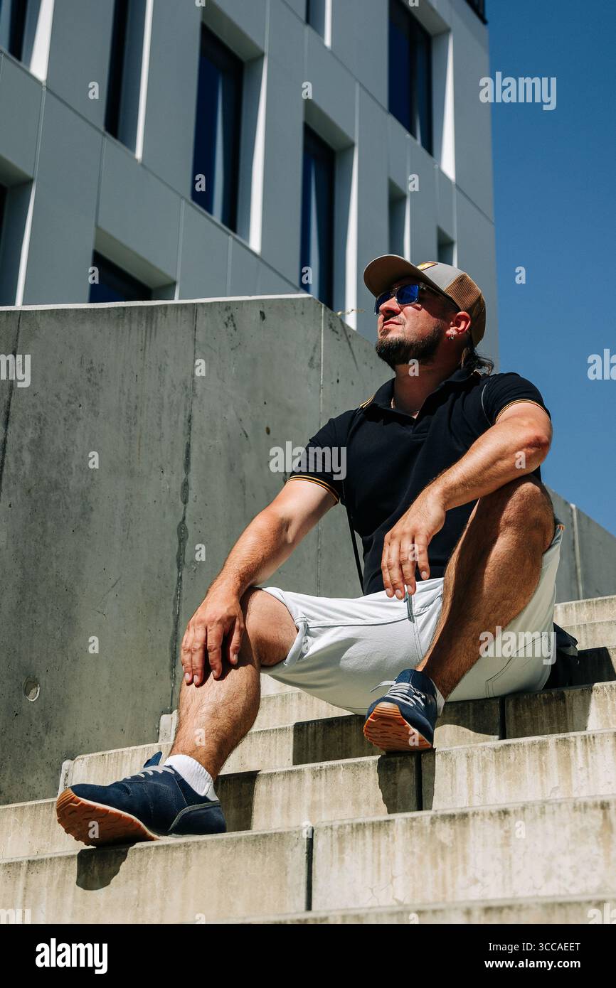 Male wearing blue cap hi-res stock photography and images - Alamy