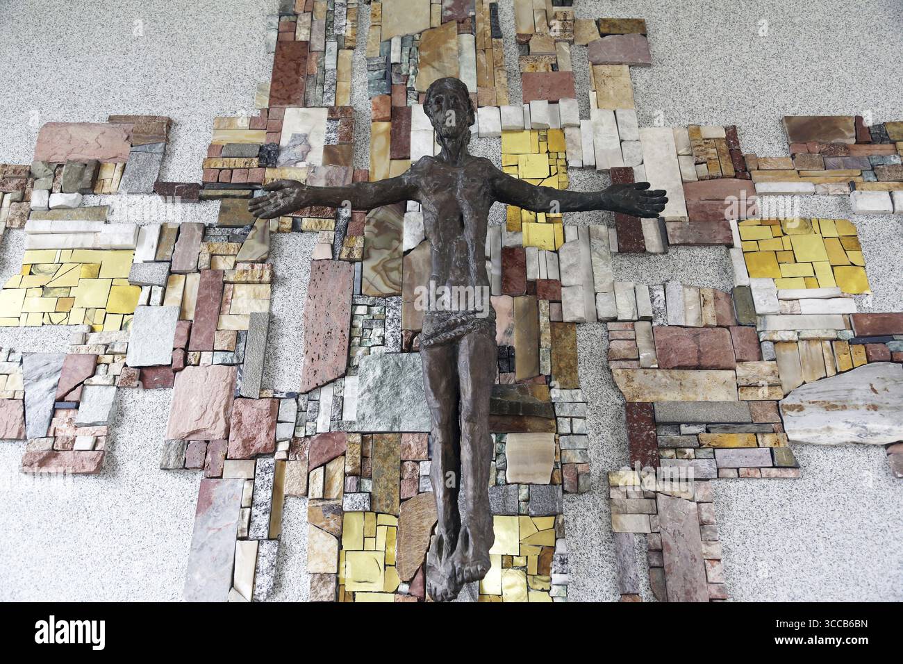 The crucifix in the parish church of St. Patrick work of painter Sieger Koder in Eggenrot, Germany Stock Photo