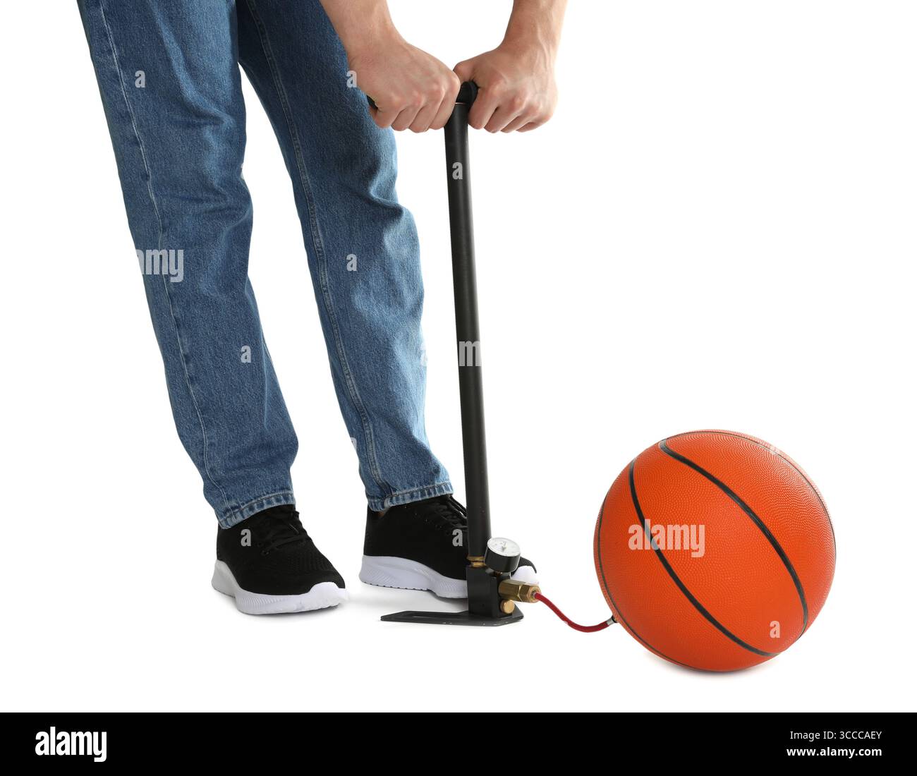 Man inflating basketball ball with manual air pump on white background ...