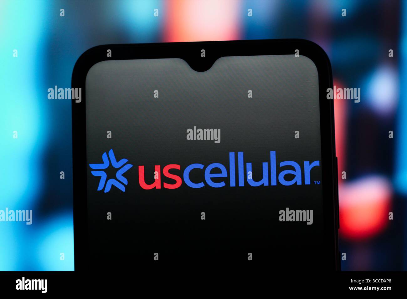In this photo illustration, the US Cellular logo is seen displayed on a ...