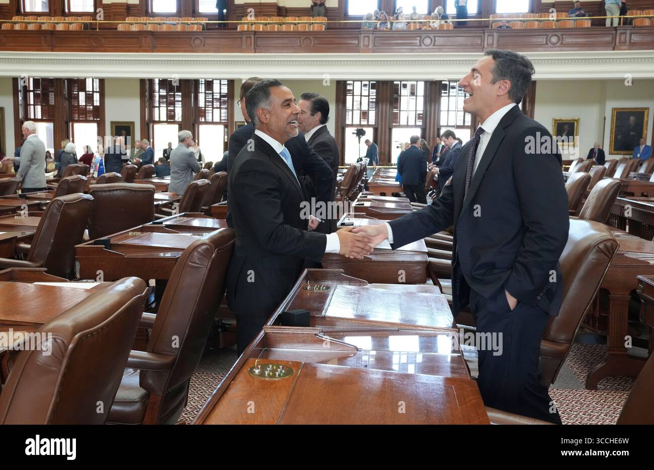 Austin, United States. 11th Aug, 2025. Democratic State Rep. EDDIE MORALES, JR. D-Eagle Pass, l, greets Republican Rep. GIOVANNI CAPRIGLIONE, R-Southlake, as the Texas House of Representatives members make a failed attempt to establish a quorum on the eighth day of a Democratic walkout over a Republican mid-decade congressional redistricting attempt. The measure would potentially give U.S. President Donald Trump five more votes in Congress. Credit: Bob Daemmrich/Alamy Live News Stock Photo