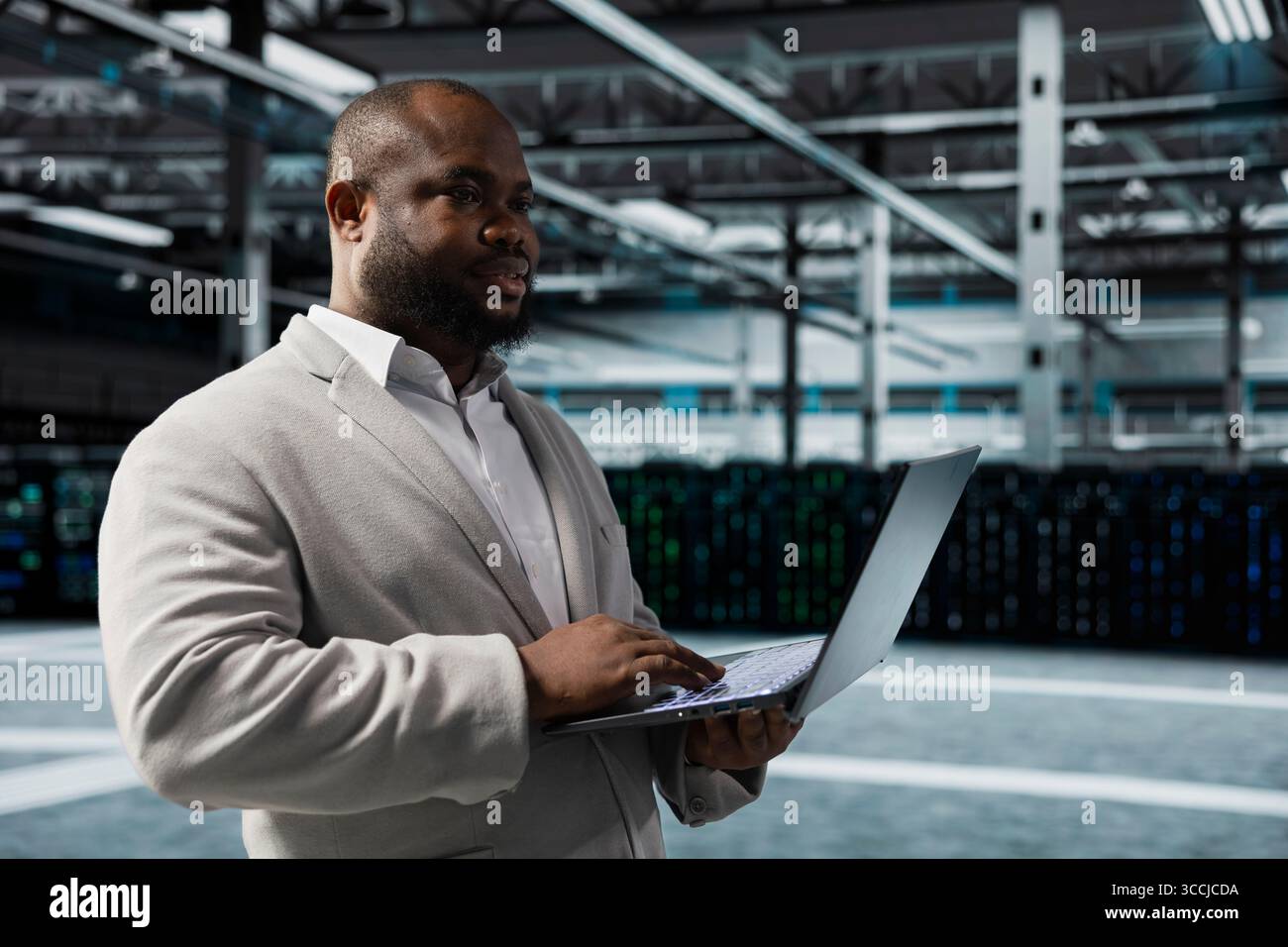 Engineer in server farm auditing systems for vulnerabilities, checking recovery plan. Data center IT specialist troubleshooting connectivity issues, making sure rigs are functioning optimally Stock Photo