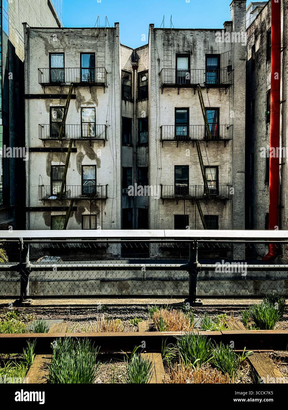 View of the High Line rail viaduct with modern residential towers and ...