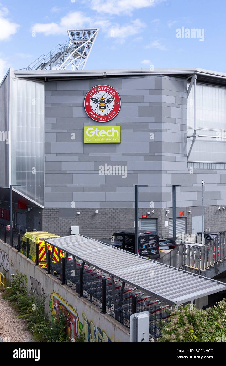 LONDON, UK - AUGUST 5, 2025 - Modern architecture of Brentford Community Stadium, home of Brentford Football Club, featuring club logo and sponsor sig Stock Photo