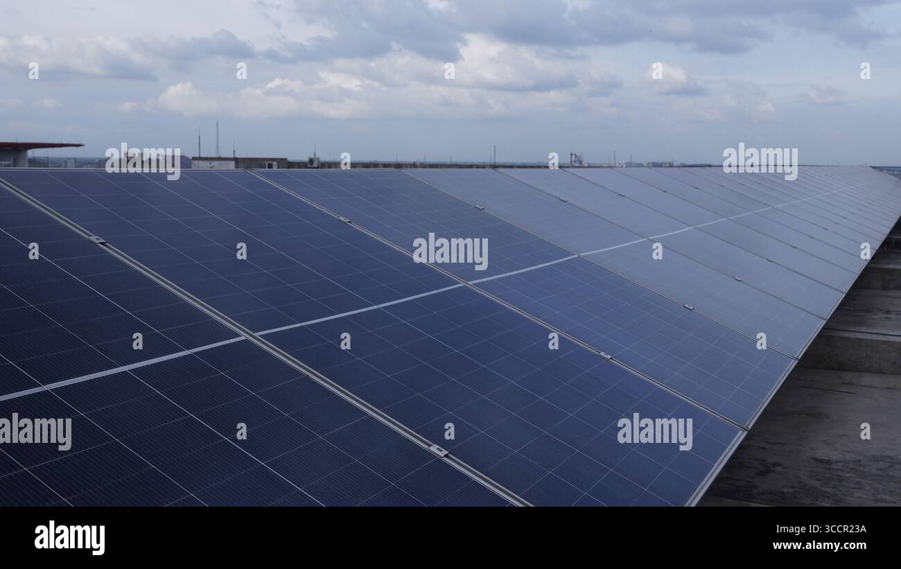 Industrial rooftop solar array powering factory operations - renewable ...