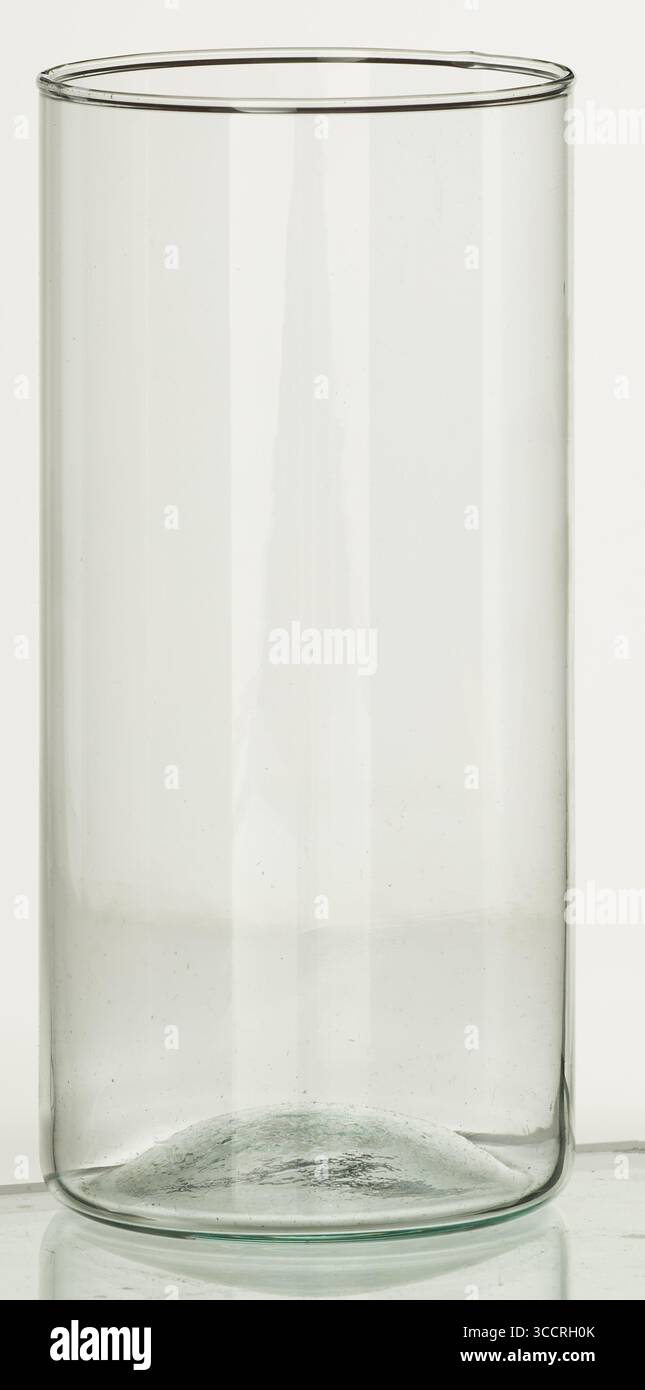 Paternless Tall, clear, patternless drinking glass isolated nature background with ...