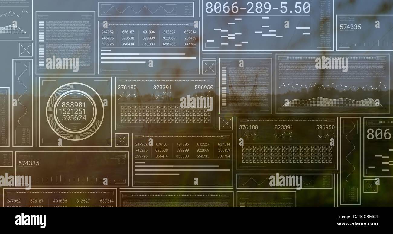 Displaying translucent data panels in interface overlay over blurred foliage, with circular gauge Stock Photo