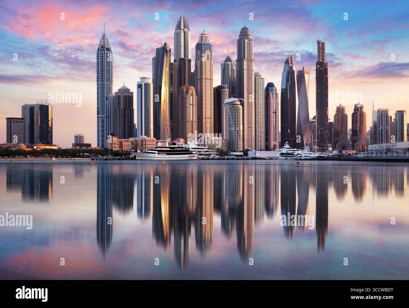 Sunset view of the Dubai Marina and JBR area and golden sand beaches in the Persian Gulf. Holidays and vacations in the UAE Stock Photo