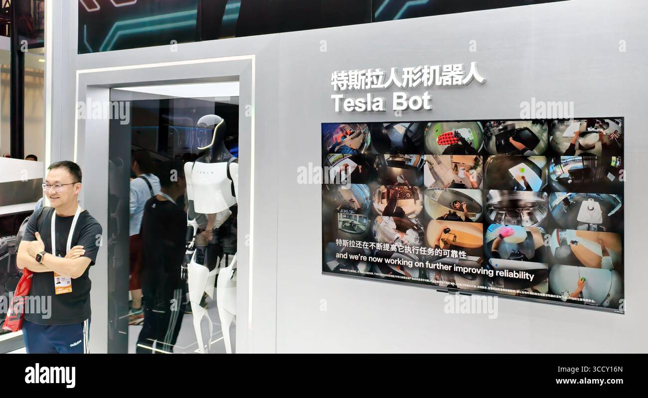 SHANGHAI, CHINA - JULY 26, 2025 - Visitors visit TESLA's booth at the ...