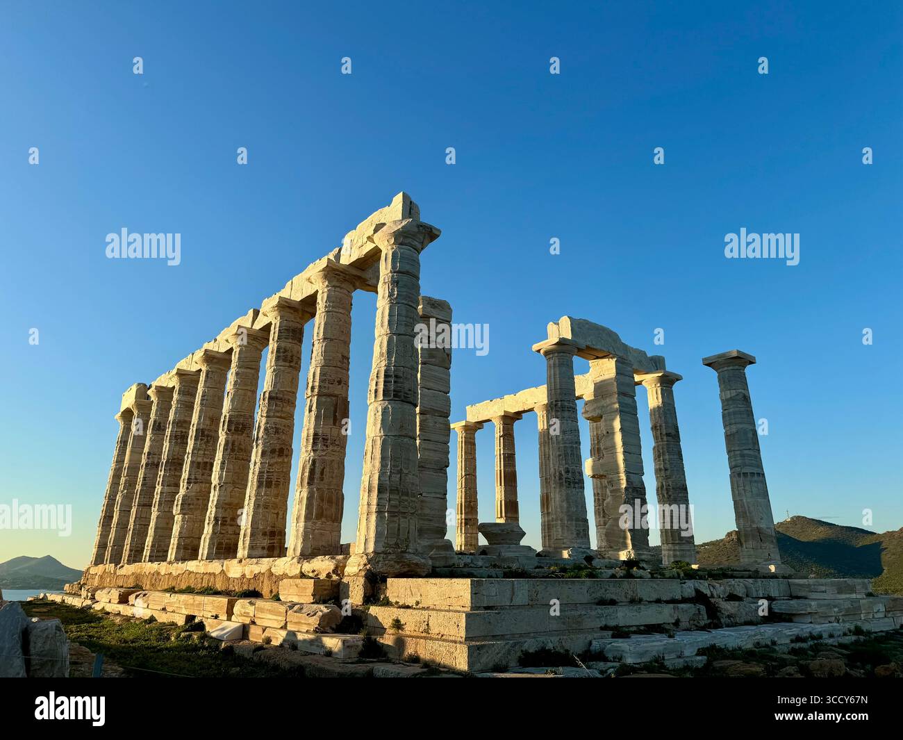Ancient Temple of Poseidon at Cape Sounion, Greece, overlooking the Aegean Sea. - Smartphone Captured Stock Image