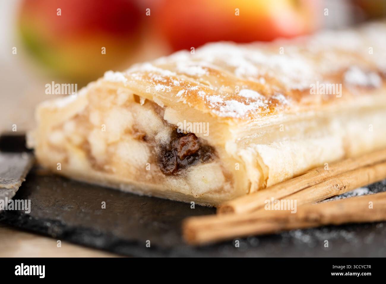 Homemade apple strudel on wooden table Stock Photo
