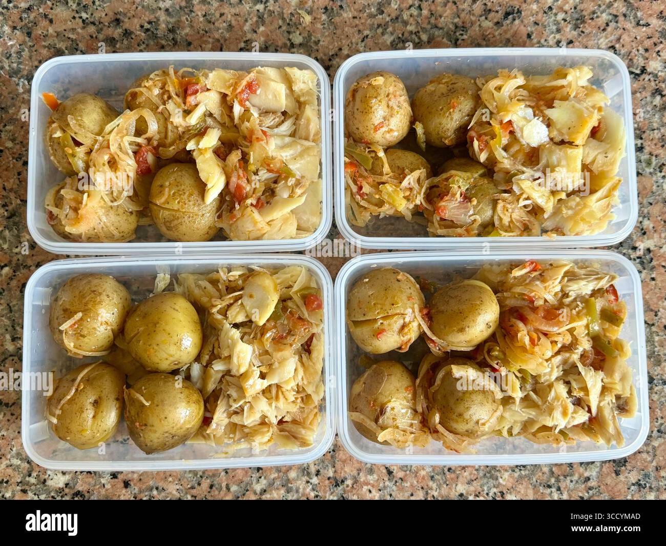 Portuguese bacalhau with potatoes prepared in containers for meal prep. - Smartphone Captured Stock Image