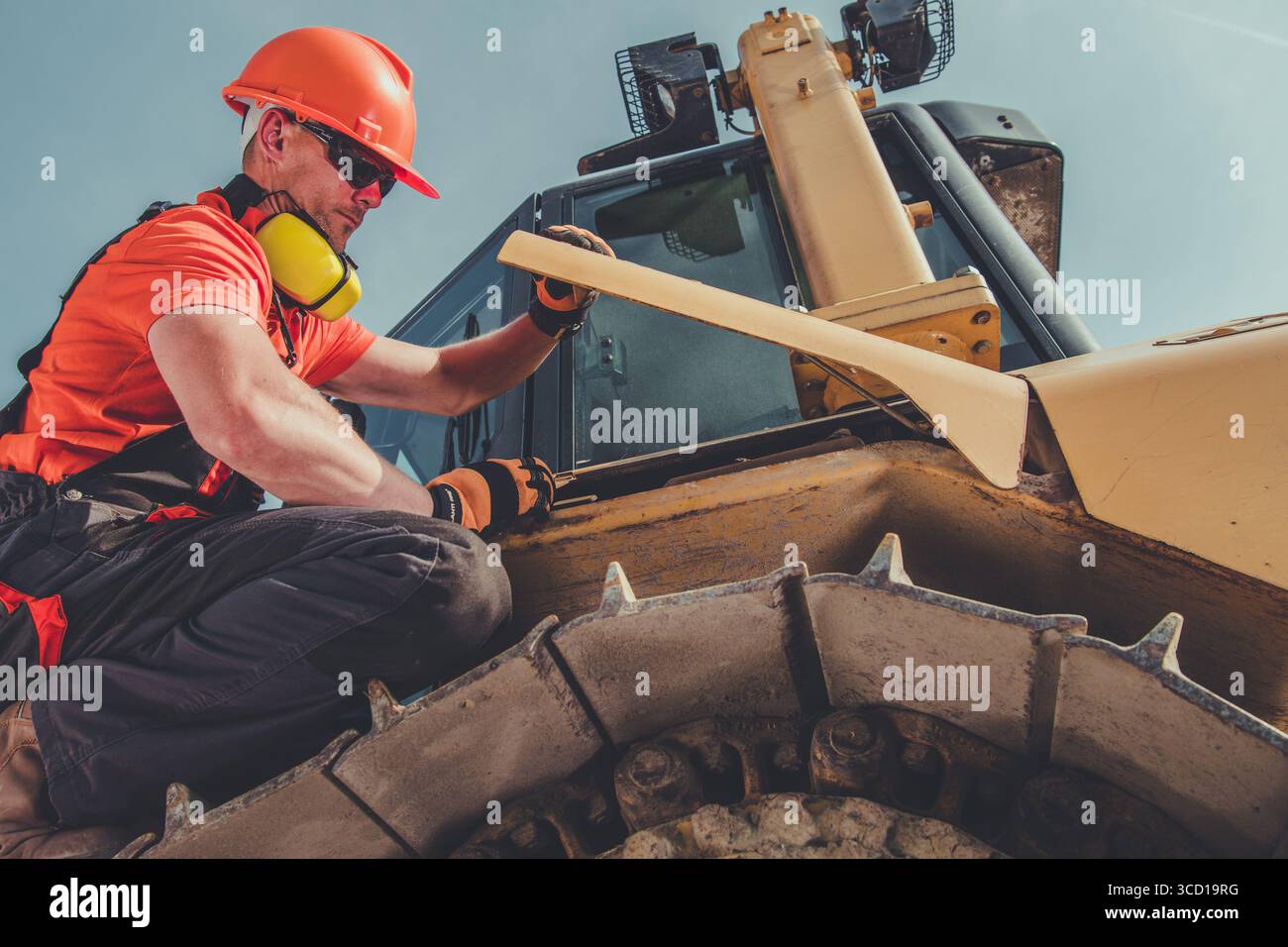Construction worker inspecting ground in hi-res stock photography and ...