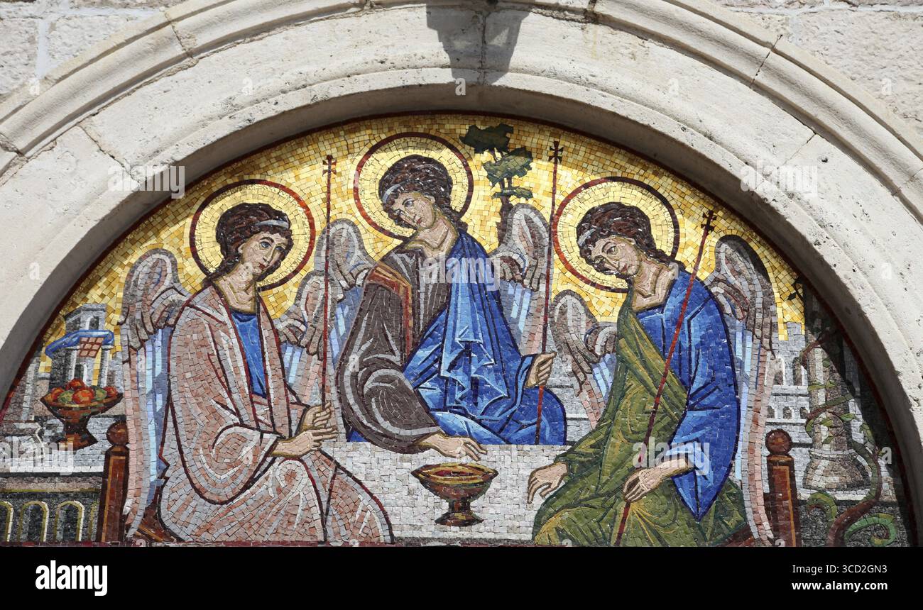 Mosaic over the entrance of the Holy Trinity Orthodox Church in Budva, Montenegro Stock Photo
