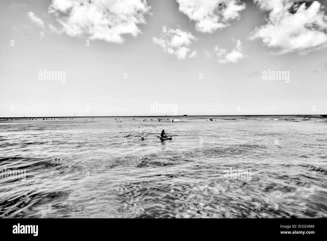 Waikiki beach surfing Black and White Stock Photos & Images - Alamy