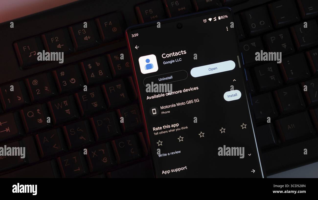 Key Contact Phone Smartphone screen displaying Google Contacts app in dark mode with ...