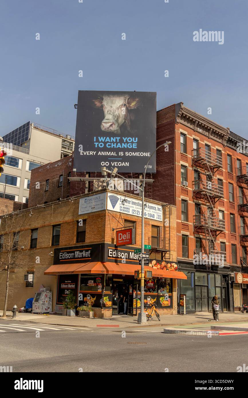 Street view looking up at a billboard at Edison Market, West 51st ...