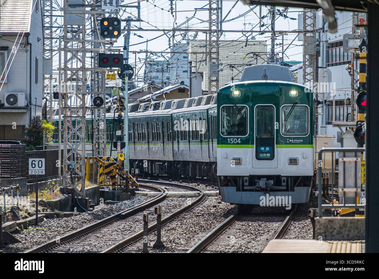 Keihan 2600 series train arriving at Fushimi-Inari Station, Fukakusa ...