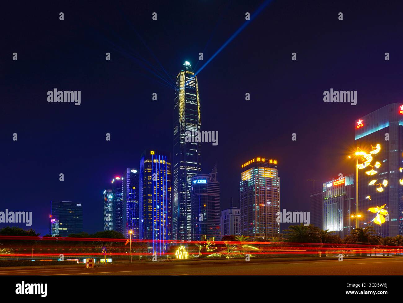 chinese mega city shenzhen - the futian city center at night with all the advertisement and commercial motion Stock Photo