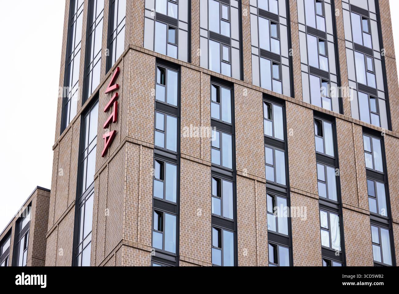 CARDIFF, UK - AUGUST 8, 2025 - Contemporary architecture of a high rise ...