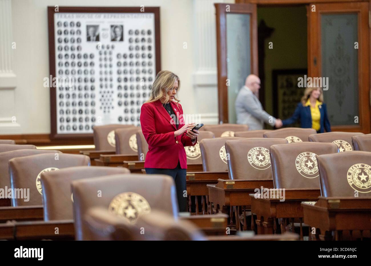 Austin, United States. 02nd Aug, 2025. State Rep. SHELLEY LUTHER, R-Tom Bean, stands among empty seats as the Texas House of Representatives members make a ninth failed attempt to establish a quorum with a Democratic walkout over a Republican mid-decade congressional redistricting bill. The measure would potentially give U.S. President Donald Trump five more Texas Republicans in Congress. Credit: Bob Daemmrich/Alamy Live News Stock Photo