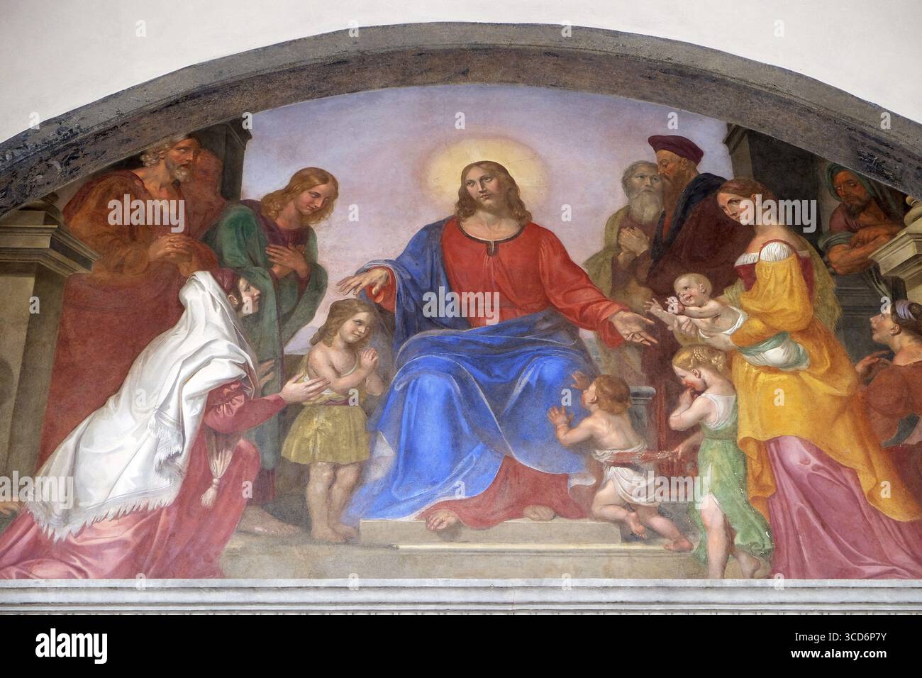 Jesus blesses the children, frescoed lunette, Ospedale degli Innocenti - Exterior arcade, Florence, Italy Stock Photo