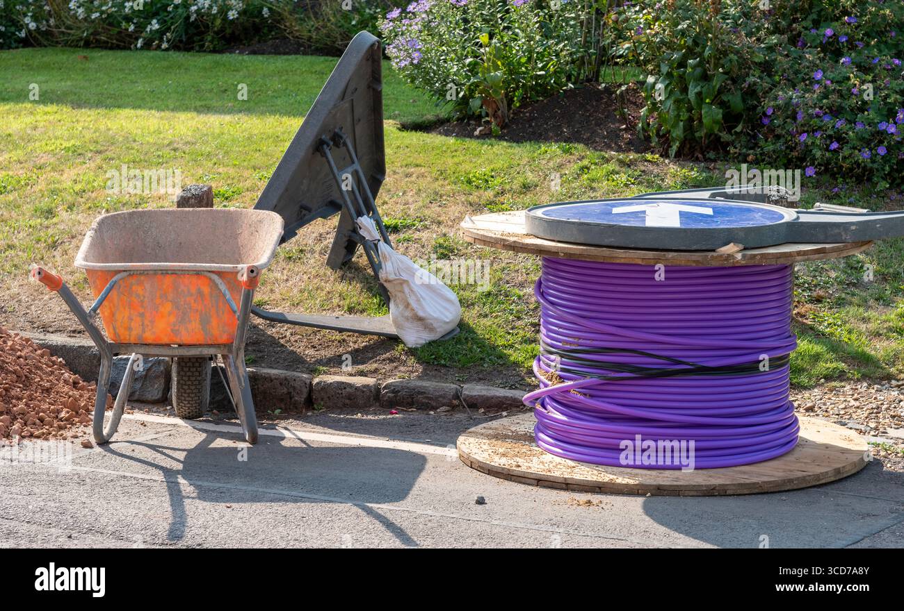 Hampshire England UK.  07.08.2025.   Reel of purple cable to be used for full fibre network cable installation. UK Stock Photo