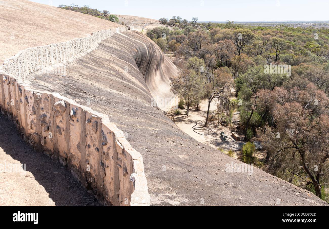 Wall above Wave Rock to funnel rain water into a drinking water storage ...