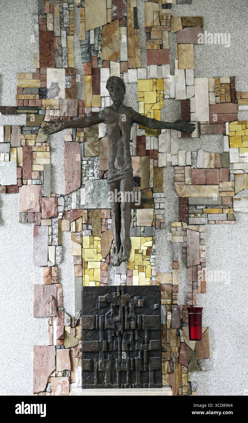 The crucifix in the parish church of St. Patrick work of painter Sieger Koder in Eggenrot, Germany Stock Photo