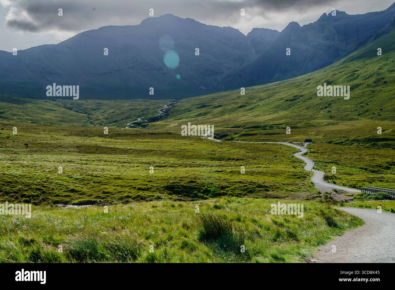 The crystal-clear Fairy Pools in Glen Brittle on the Isle of Skye, Scotland, with waterfalls and the Cuillin mountains in the background. Stock Photo
