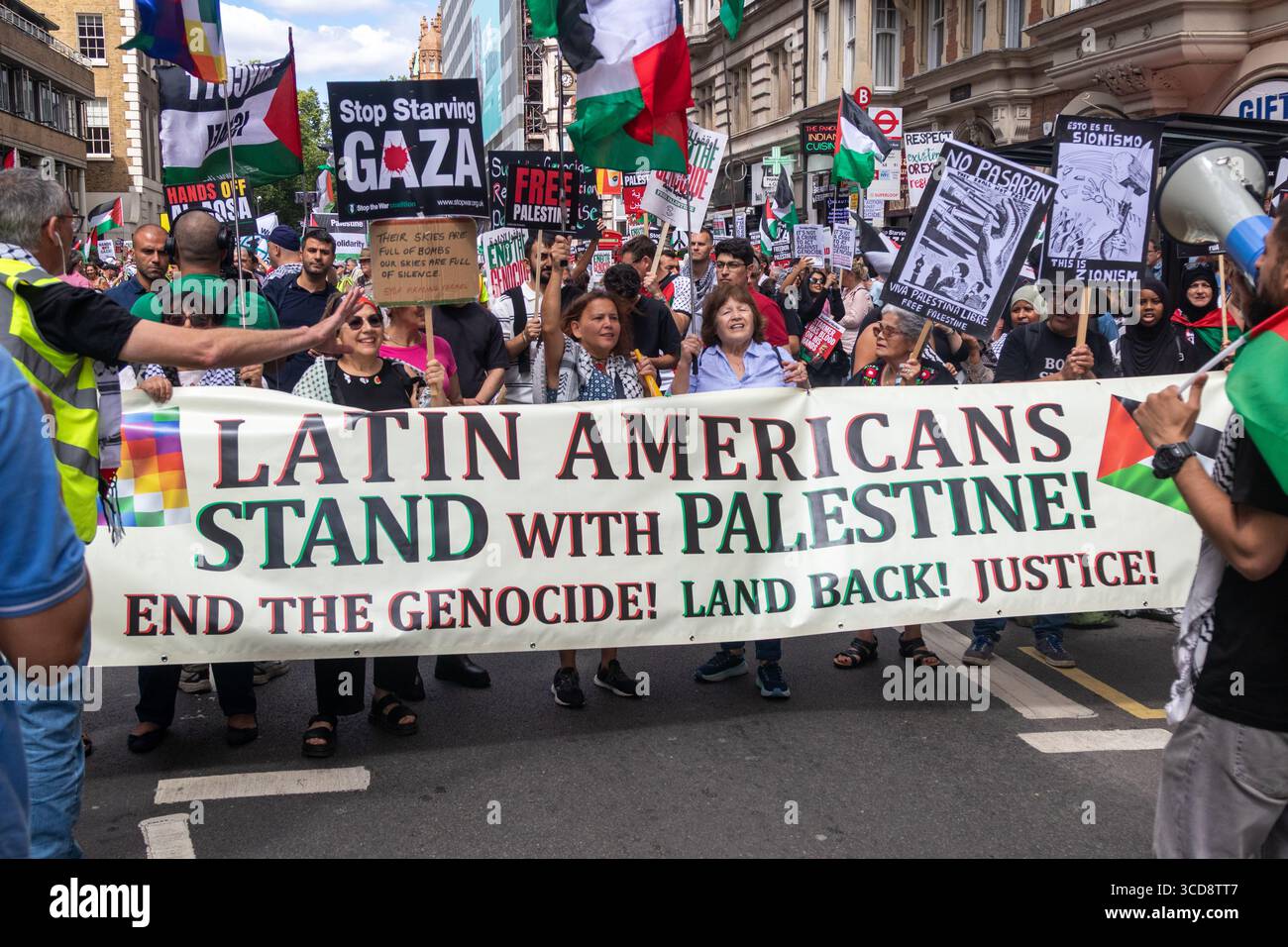 London, United Kingdom, August Ninth 2025 :- A pro Palestine, Anti War in Gaza Protest in Central London, a banner from latin americans stand with pal Stock Photo